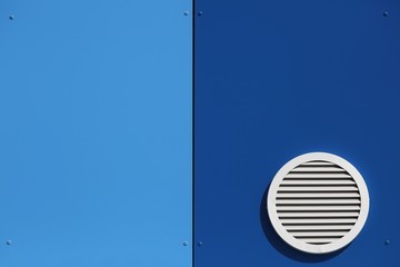 Ventilation system and circle vent window on a wall 