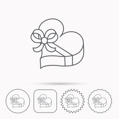 Love gift box icon. Heart with bow sign.