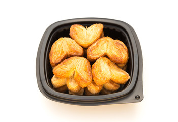 homemade heart shape sweet biscuit on a white background
