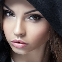 Closeup portrait of girl with brown eyes.