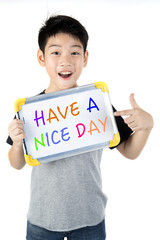 Asian boy with white board with word HAVE A NICE DAY