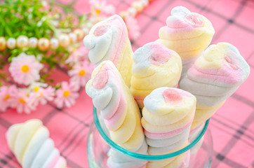 Twisted marshmallow in glass.