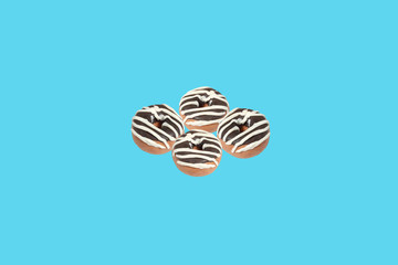 miniature donut model from japanese clay on blue background