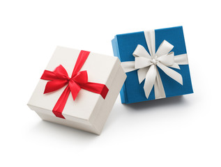 White and blue gift box with ribbon isolated on white background