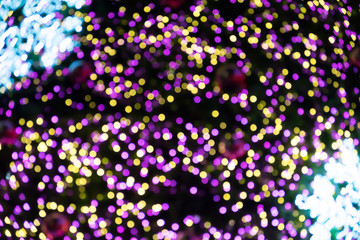 Fototapeta na wymiar Lights blurred bokeh background from christmas night party