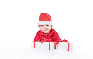 Beautiful little baby celebrates Christmas. New Year's holidays.