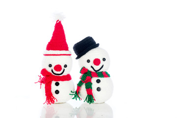 Two smiling snowman