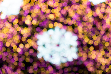 Lights blurred bokeh background from christmas night party
