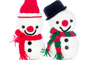Two smiling snowman