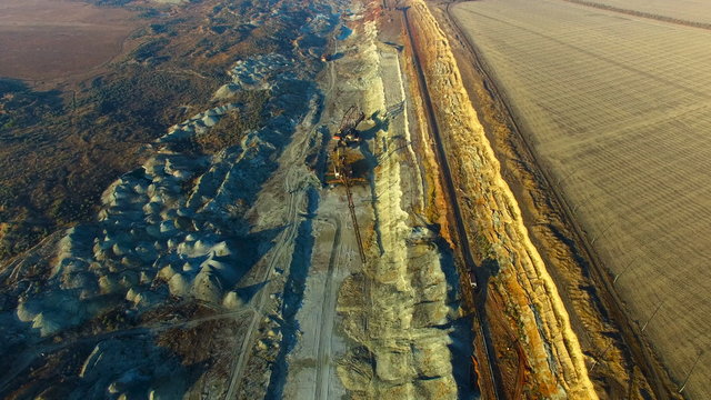 Flight Over the Manganese Ore old Quarry and on Excavators