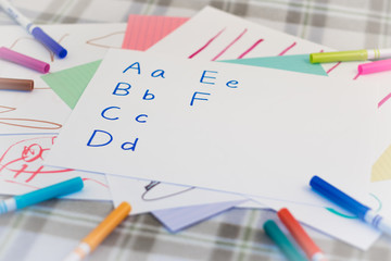 English; Kids Writing Some English Alphabet for Practice