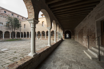 cloister of the monastery Ss. Cosmas and Damian, now a center "artisans of the cloister" with studies for the artistic work at the island of Giudecca in Venice