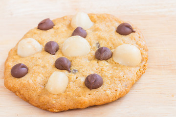 Cookies, Macadamia and Chocolate Chip on Wooden background