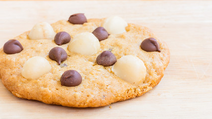 Fototapeta na wymiar Cookies, Macadamia and Chocolate Chip on Wooden background