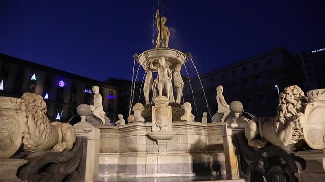 Nocturnal view of the Neptune Fountain in Naples, Italy