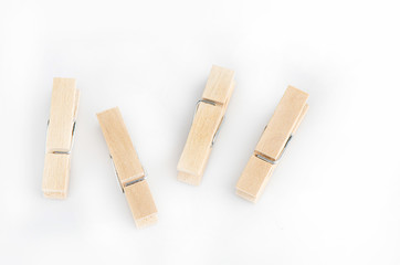 Wooden clothespins isolate on white background.
