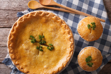 American Chicken pot pie close up on the table. horizontal top view
