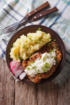 American food: Country Fried Steak and White Gravy vertical top view
