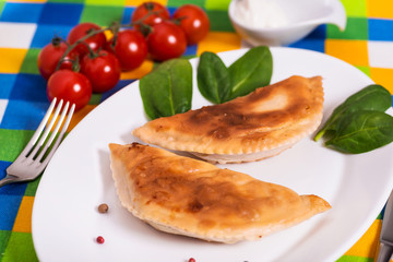 Нot pasties with sour cream, spinach and cherry tomatoes