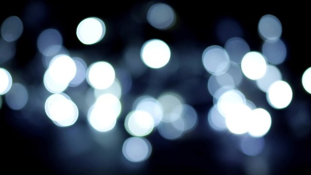 1080p video of bright twinkling lights set on a black background.