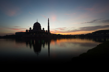 A silhouette of a mosque