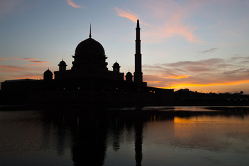 A silhouette of a mosque