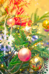 Closeup of Christmas tree decorations background ( Filtered imag