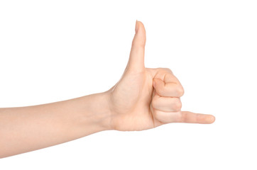 Beauty and Health theme: beautiful elegant female hand show gesture on an isolated white background in studio