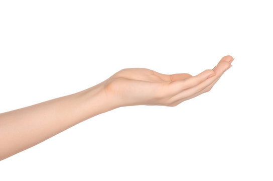 Beauty and Health theme: beautiful elegant female hand show gesture on an isolated white background in studio