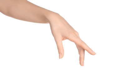 Beauty and Health theme: beautiful elegant female hand show gesture on an isolated white background...