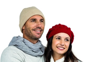 Smiling couple looking away