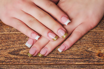 French nail art in gold color