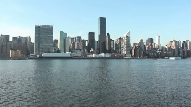 HD clip of the Manhattan, New York skyline over the East River from Queens