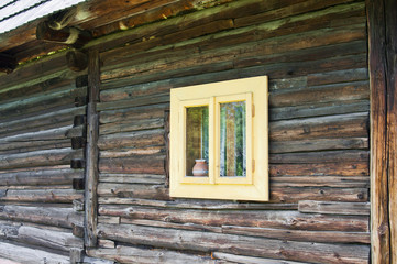 Obraz na płótnie Canvas Small light window on a chalet