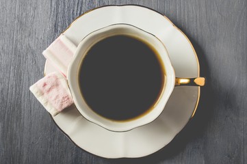 Cup of coffee with marshmallow, retro style  , with retro filter