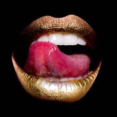 Fototapeta premium Lips with tongue on black