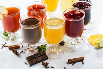 mulled wine. fruit or berry drink. alcohol winter. against a bright background