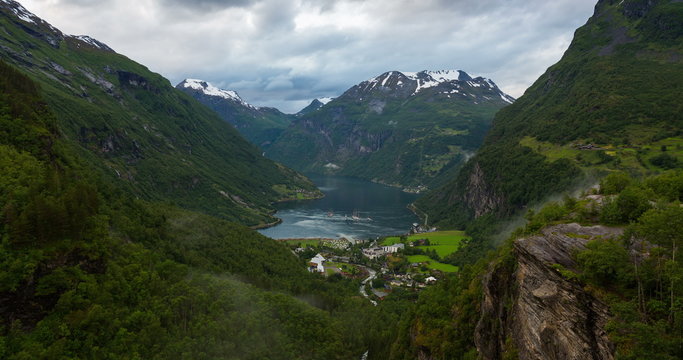 4K, Norway Mountains And Fjord View - Occurrence of fog, Clouds Time Lapse, Geirangerfjord, Stranda, Norway - Til Down