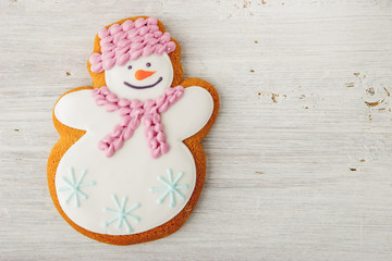 Gingerbread snowman on the white table