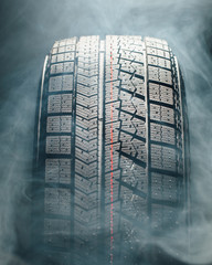 winter tire in smoke