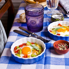 Fried eggs with vegetables