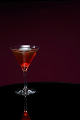manhattan on the table with cherry