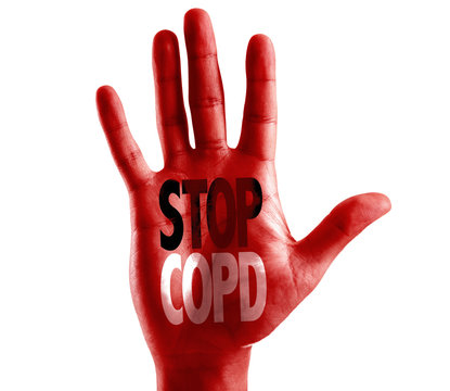 Stop COPD written on hand isolated on white background