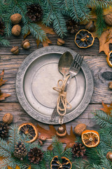 Fototapeta na wymiar Festive table plate cutlery decorations well gifts nature