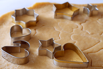 Dough rolled out and cookies cut out