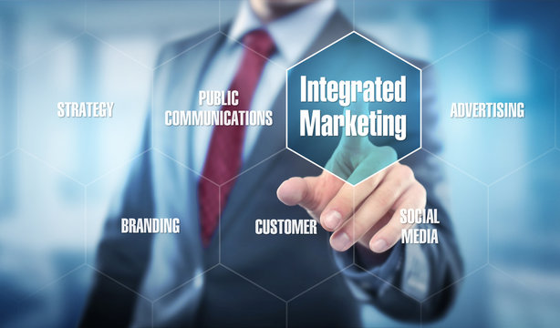 Man in Office touching display Integrated Marketing