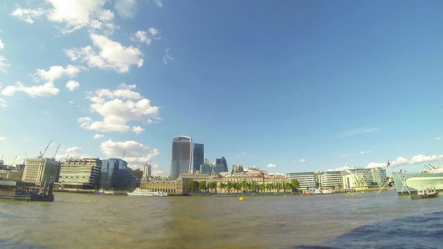 Timelapse view of London city with river Thames and skyscrapers
