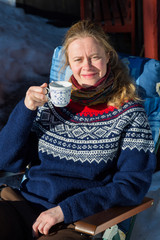 Close up of young pretty Norwegian woman enjoying some winter su