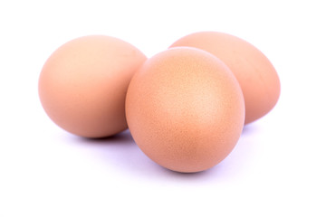 three eggs isolated on white background
