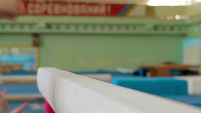 Gymnast Practicing On Balance Beam Slow Motion